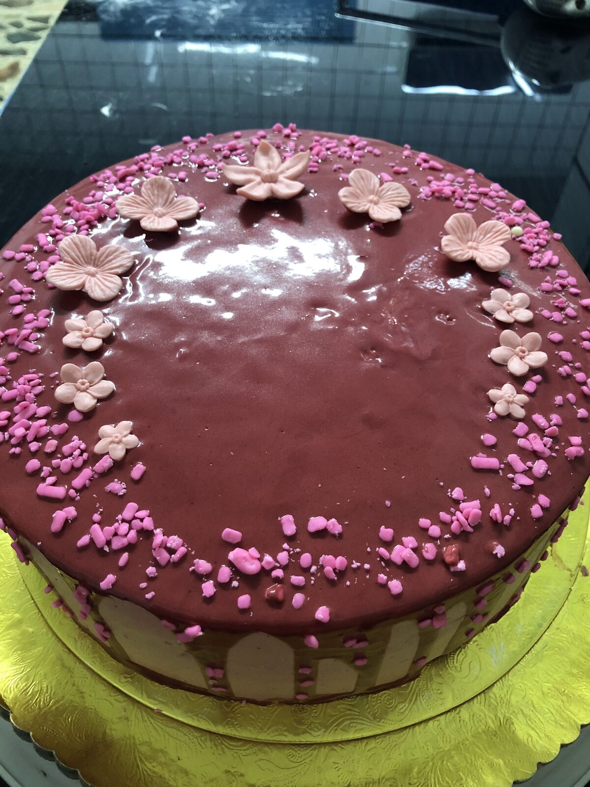Pink drip birthday cake with pearl accents